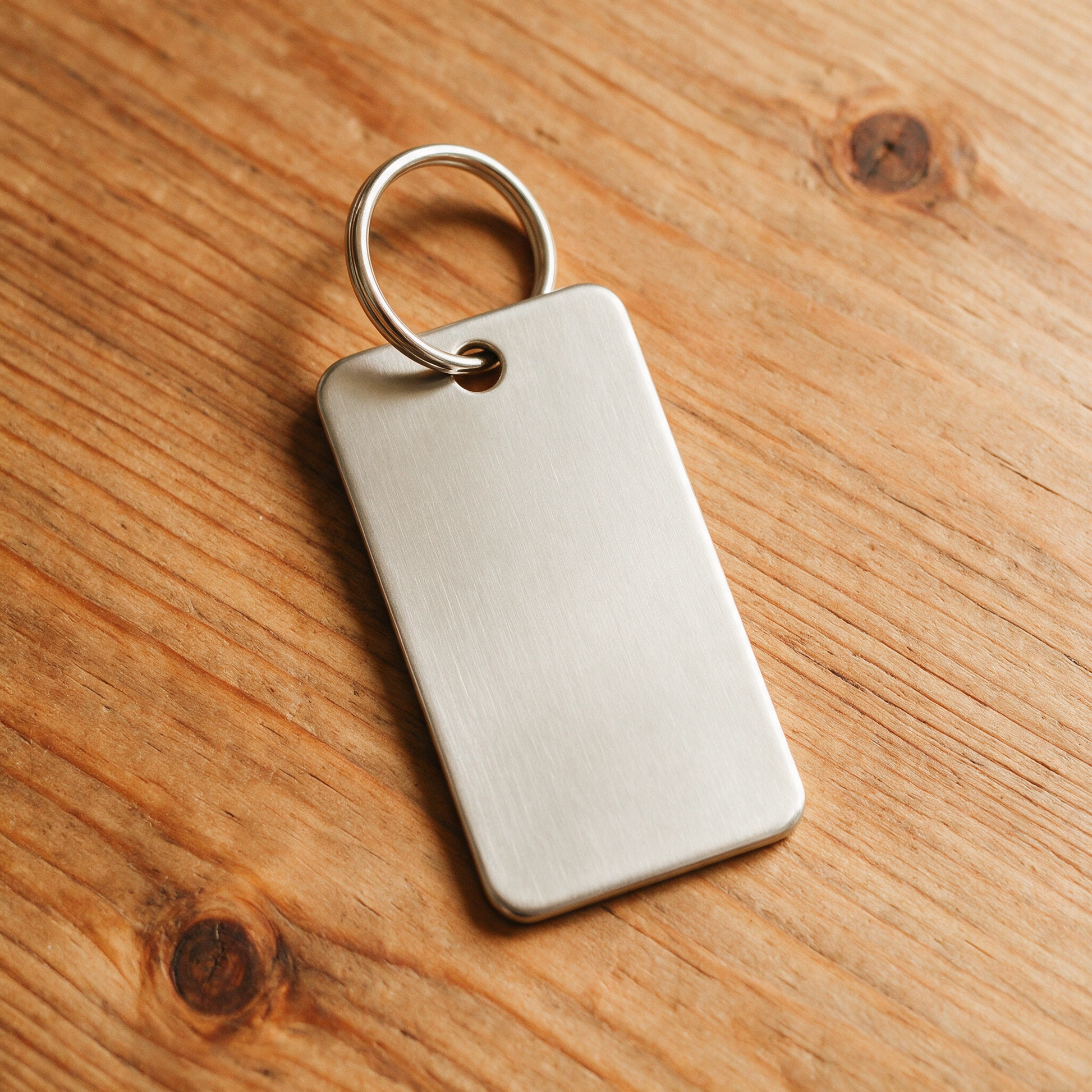 Blank metal keychain tag ready for custom engraving